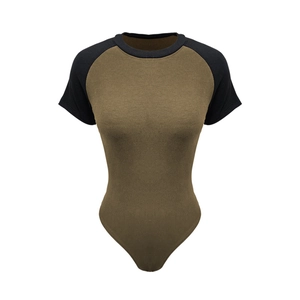 Close-up of olive and black contrast raglan sleeves on ribbed knit bodysuit for women