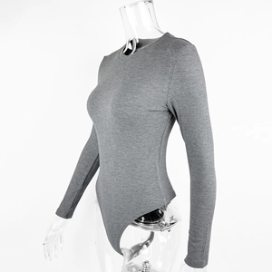 Close-up of gray ribbed long sleeve bodysuit showing stretch fabric texture and slim fit