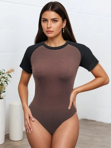 Detail of contrast raglan sleeves and ribbed texture on slim fit bodysuit