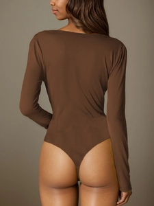 Detailed back view of a brown long sleeve thong bodysuit with slim fit stretch fabric