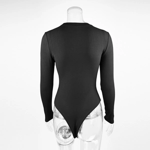 Close-up of black ribbed knit bodysuit on mannequin showing fabric texture and back cut