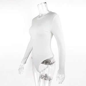 Detail view of white ribbed bodysuit featuring crew neck and slim-fit long sleeves