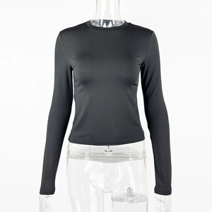 Front view of black slim-fit crew neck long sleeve tee on transparent mannequin