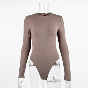 Detail showing the taupe ribbed knit fabric texture and crew neck of the slim bodysuit