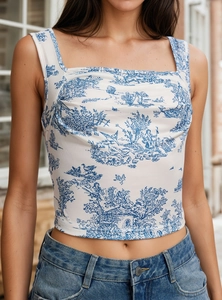 Detailed view of white and blue Toile de Jouy print crop top with square neckline