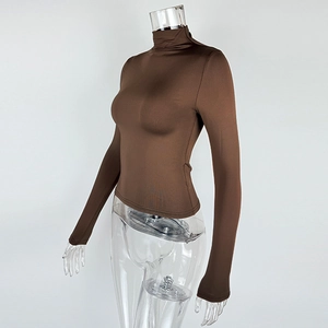 Detail of slim fit turtleneck long sleeve top in dark chocolate brown stretch fabric
