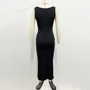 Detail of a slim-fit black sleeveless maxi dress with a U-shaped back design on mannequin