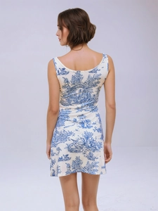 Back view of a white and blue French Toile de Jouy print sleeveless mini dress for women