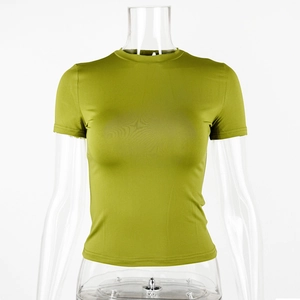 Detail of avocado green slim fit t-shirt with crew neck on a clear mannequin