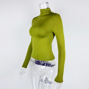 Detail shot of olive green mock neck long sleeve top showing slim fit and elastic fabric
