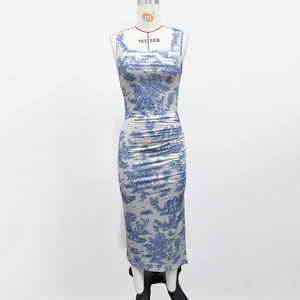 Detail of blue toile de jouy print on white slim dress with side ruched texture