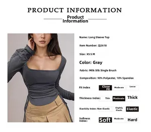 Detail of square neckline and side drawstring ruching on grey slim-fit long sleeve top
