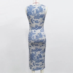 Detail showing vintage Toile de Jouy blue landscape print on white summer dress fabric