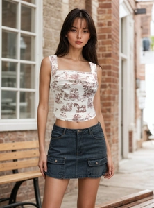 Detail of crop tank top with vintage landscape print and square neckline design