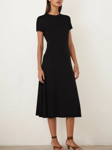 Elegant women's black short sleeve A-line midi dress with a simple crew neck design