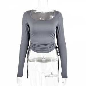 Detail of ruched drawstring hem on a slim-fit dark grey long-sleeved square neck T-shirt