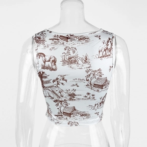 Detail of the back view of a white crop top with brown pastoral landscape print