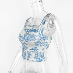 Detail view of the French Toile de Jouy ink print and square neckline on the crop top