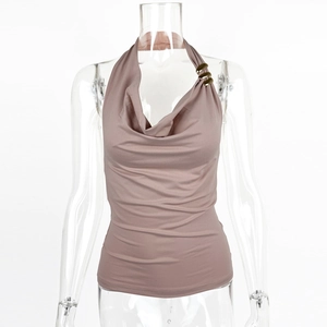 Detail of cowl neck draped collar with three stacked gold metal rings on dusty pink top