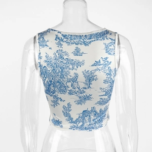 Detailed back view of a blue and white Toile de Jouy print cropped camisole top
