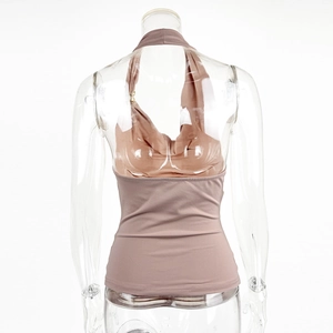 Detailed back view of brown halter neck top showing slim fit design and open back style