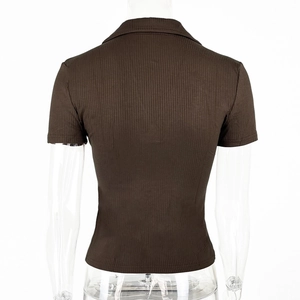 Macro shot of dark brown ribbed knit fabric and polo collar stitching details