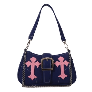Blue canvas shoulder bag with pink cross patches and silver chain strap details