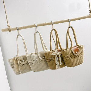 Woven straw handbags with wave textures, faux leather flaps, and pearl buckle details