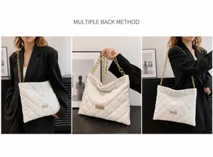 Close-up of white quilted bucket bag featuring a gold chain and fashion patch detail