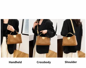 Brown faux crocodile leather bag showing handbag, crossbody and shoulder carry styles