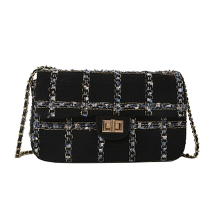 Klassieke tweed crossbodytas met gouden ketting en draaisluiting in marineblauw