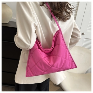 Detailed view of magenta quilted oxford cloth tote bag with stylish diamond pattern
