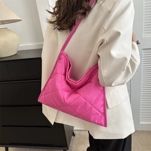 Rose red quilted nylon tote bag for women featuring a spacious lightweight puffer design