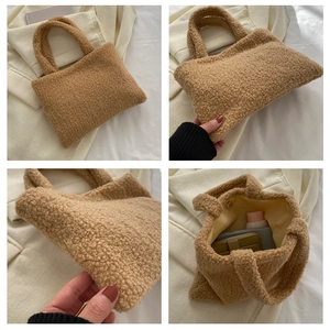 Detail view showing soft brown plush teddy fabric texture and interior magnetic closure