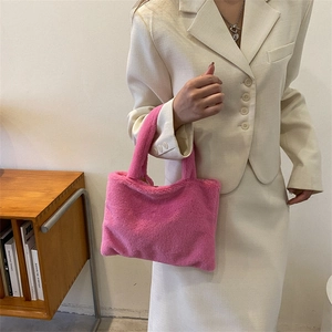 Chic rose pink plush handbag with a large capacity and soft faux fur texture for winter