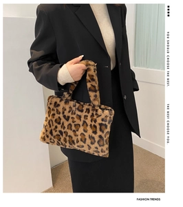 Fashionable leopard print faux fur handbag with soft plush texture for winter style