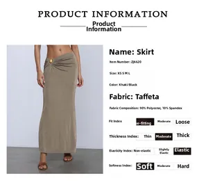 Detail of khaki skirt fabric composition and golden ring hardware decoration