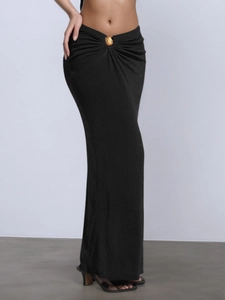 Black asymmetric low-waist maxi skirt with gold shell metal buckle and knot detail