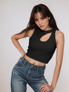 Detail of black ribbed crop top with front crescent cutout and fitted texture