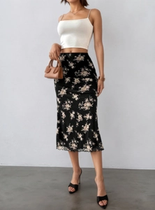 Elegant high-waist floral midi skirt with ruffled hem and slim fit French style