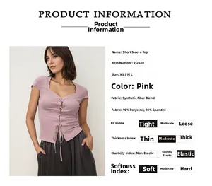 Detail showing the pink lace-up tee fabric composed of 90% polyester and 10% spandex