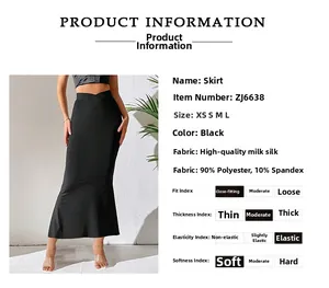 Detail of slim fit fishtail skirt in black milk silk fabric with waist cutout and soft texture
