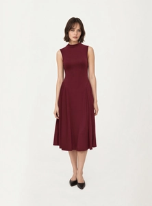 Elegant burgundy high-neck sleeveless knit dress with flowing A-line midi skirt