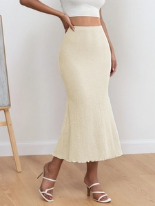 Elegant high-waist knit mermaid skirt in cream with a flattering bodycon silhouette