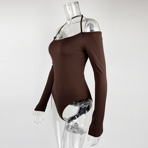 Detail of chocolate brown long sleeve bodysuit with cold-shoulder and thin straps