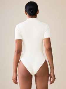 White ribbed short sleeve bodysuit with high neck and slim fit back view