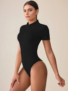 Slim fit black short sleeve bodysuit in ribbed knit fabric with half turtleneck and zipper