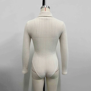 Detailed back view of white long sleeve turtleneck bodysuit in ribbed knit fabric