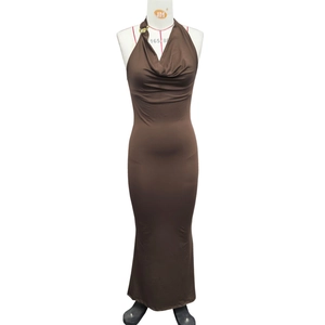 Detailed view of the brown cowl neck halter dress showing slim-fit bodycon texture