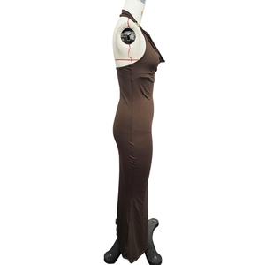 Detail view of the brown halter neck maxi dress with slim fit and elastic knitted fabric